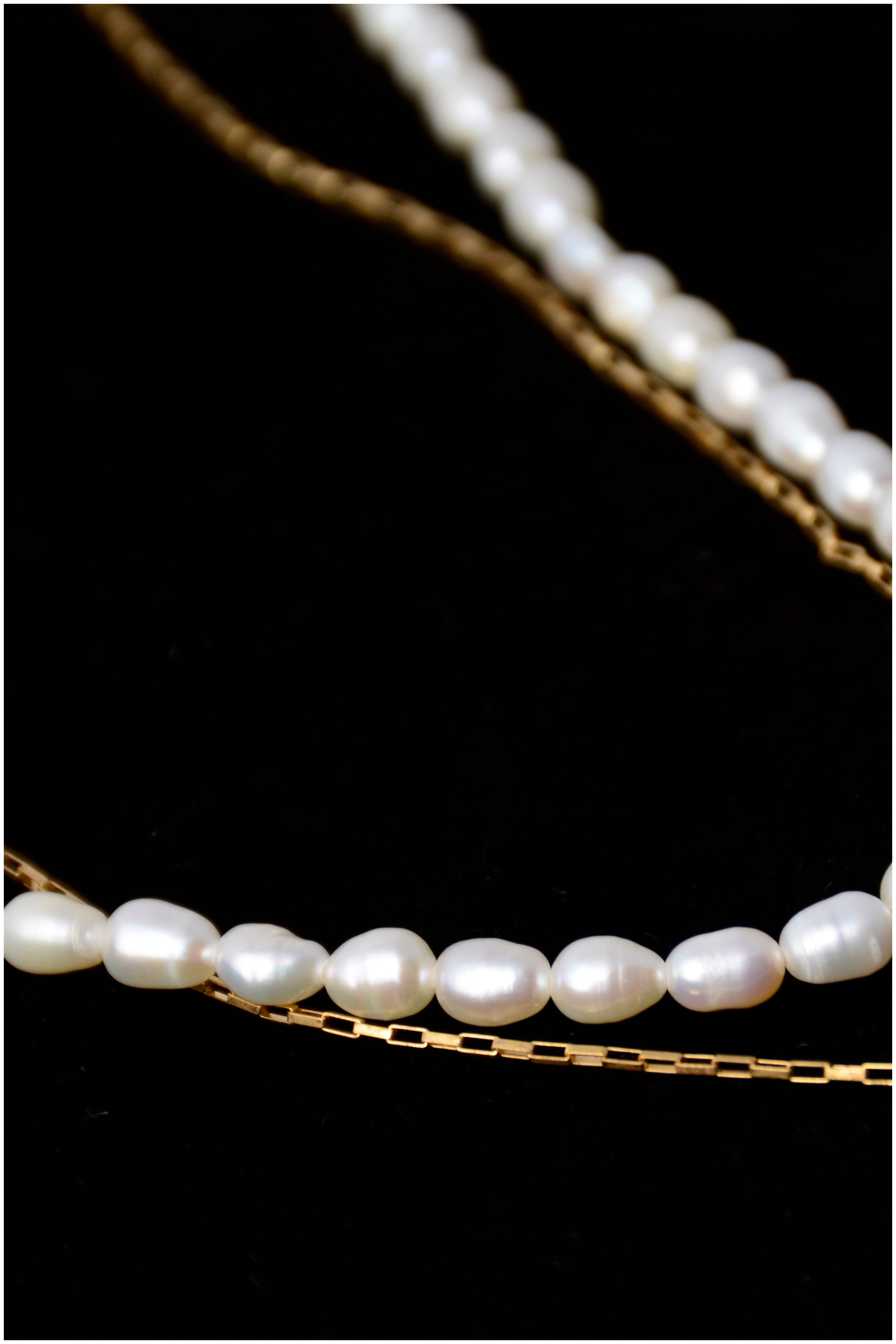 Double chain and pearl necklace