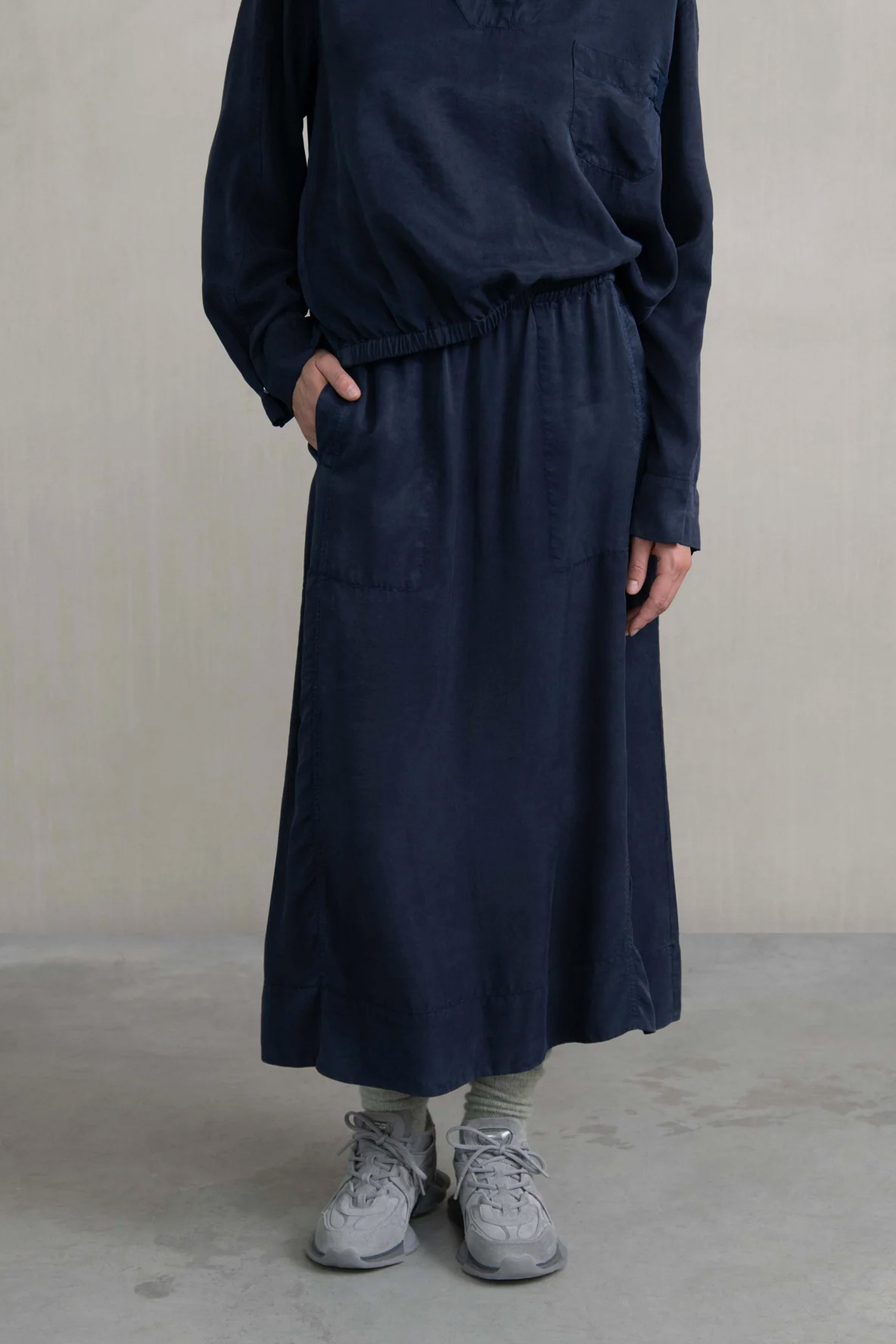 Falda goma bolsillos