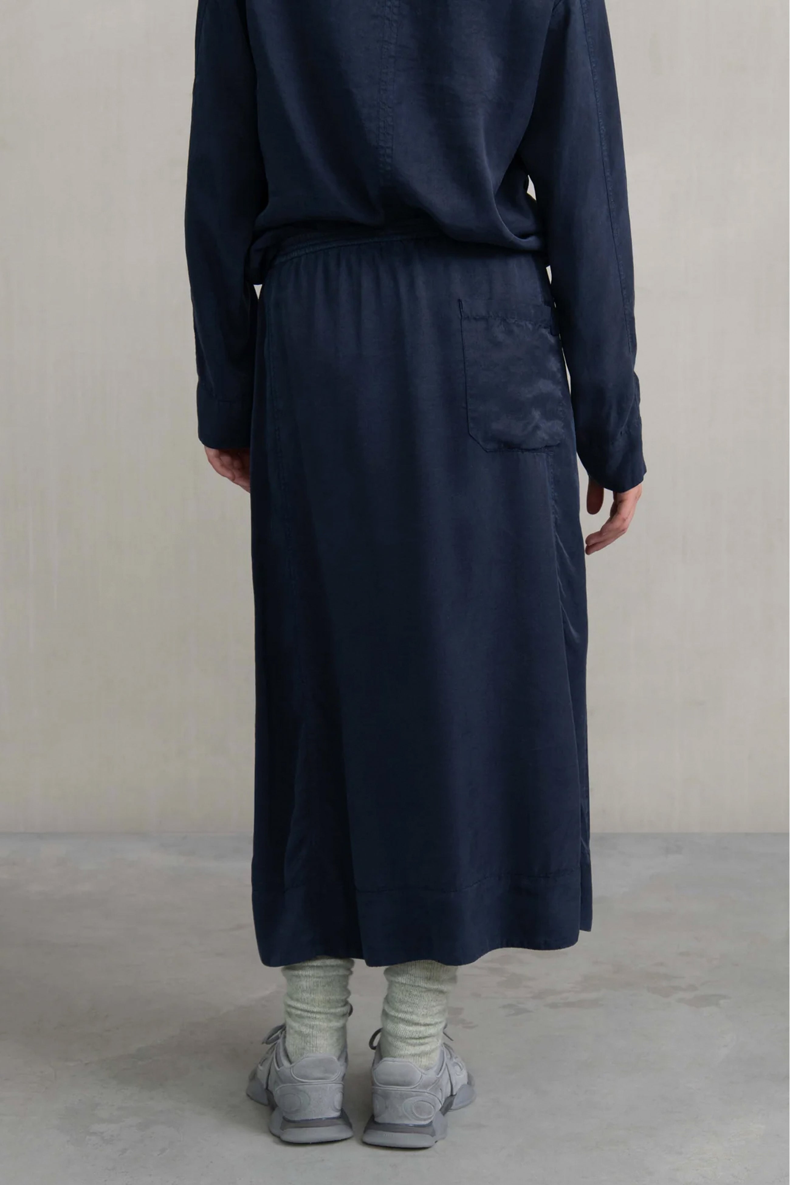 Falda goma bolsillos