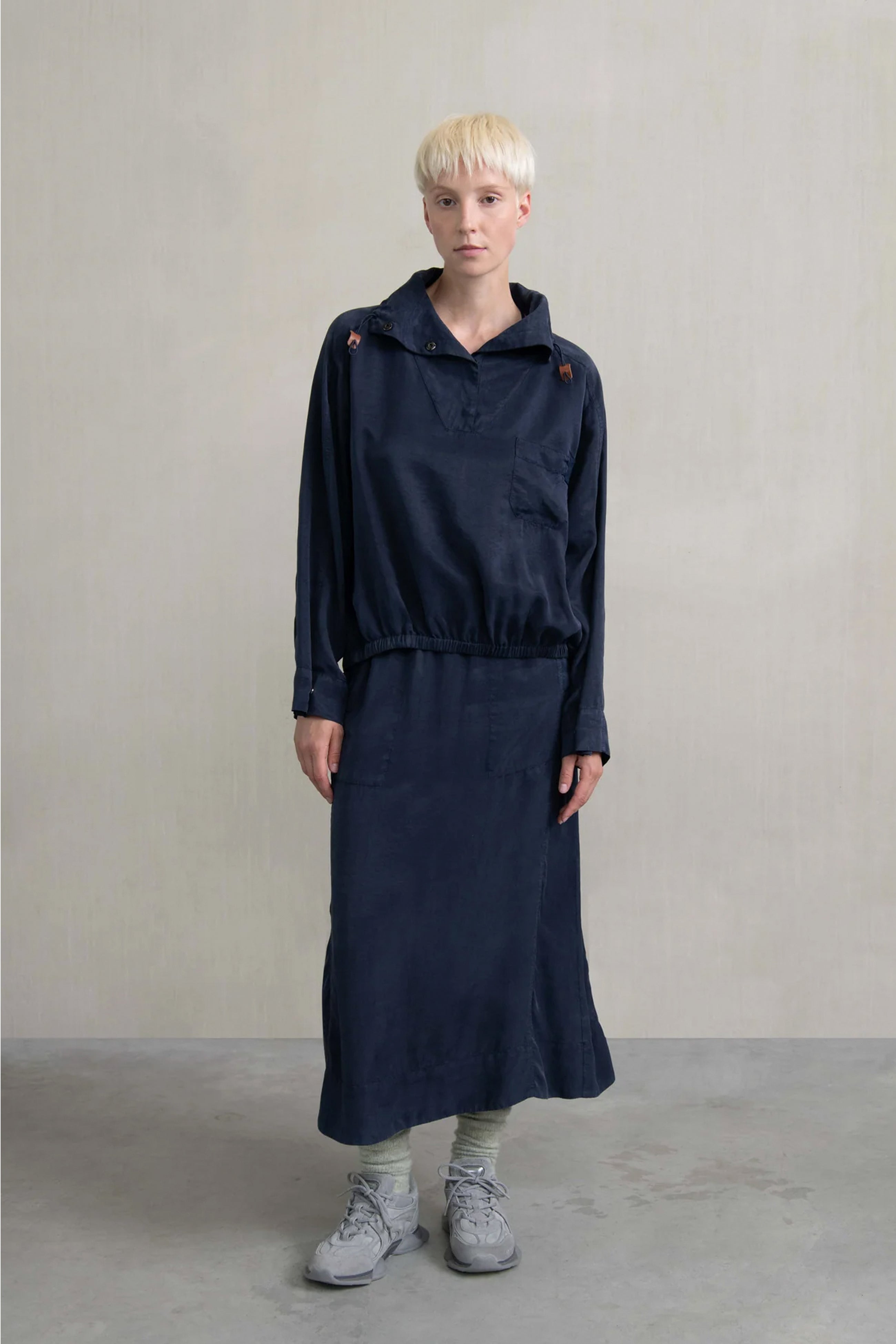 Falda goma bolsillos