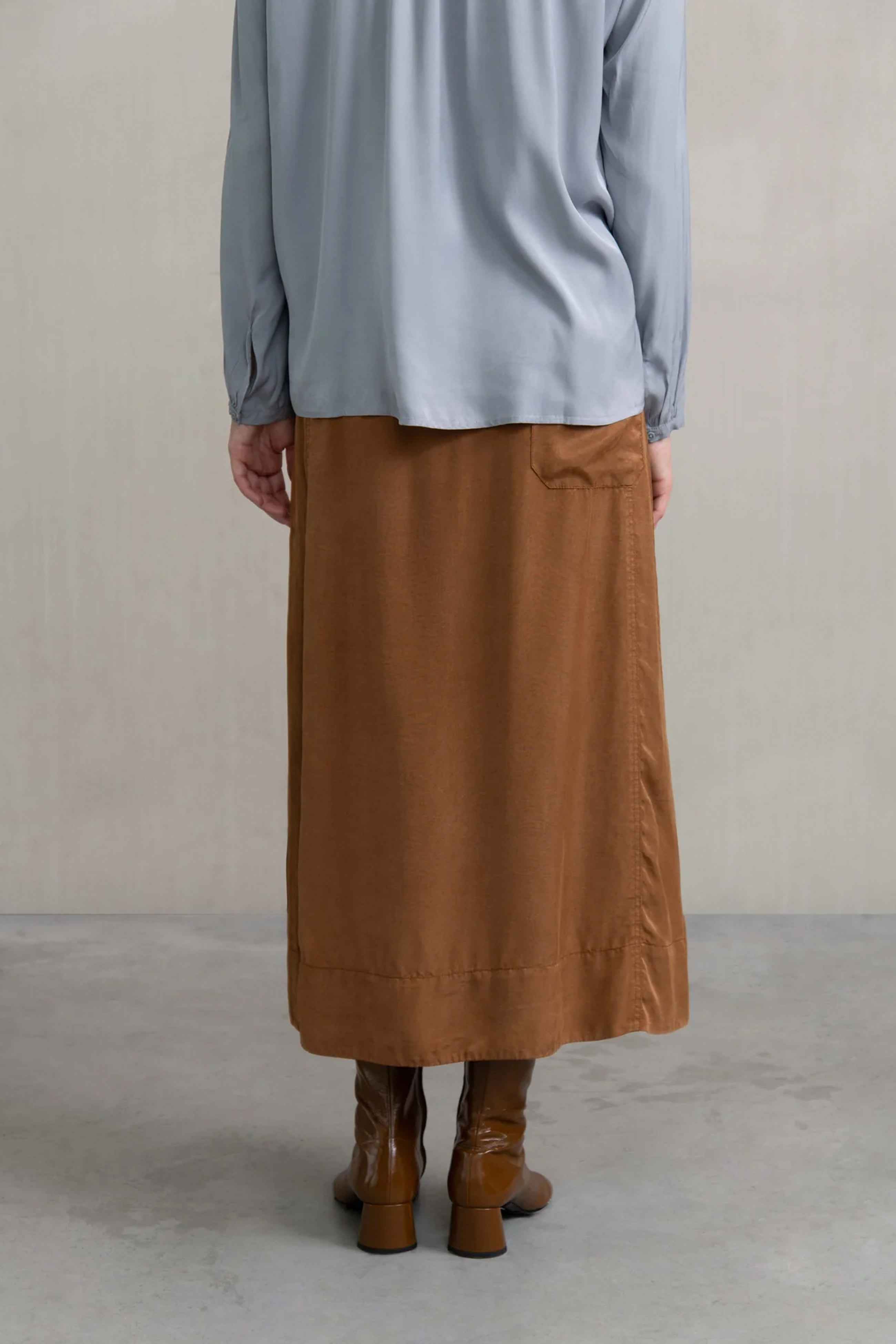 Falda goma bolsillos