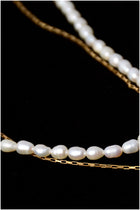 Double chain and pearl necklace 