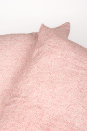 Almohadón ondas rosas