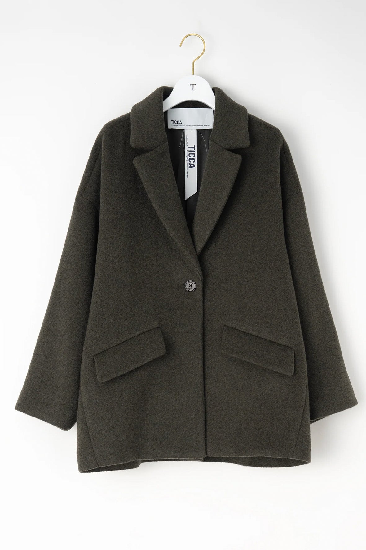 Abrigo chaqueta un botón