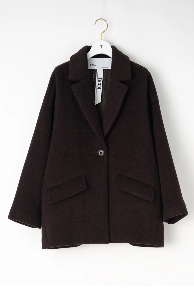 Abrigo chaqueta un botón