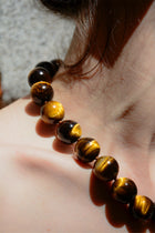 Collar bolas grandes ojo de tigre