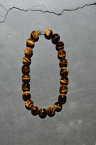 Collar bolas grandes ojo de tigre