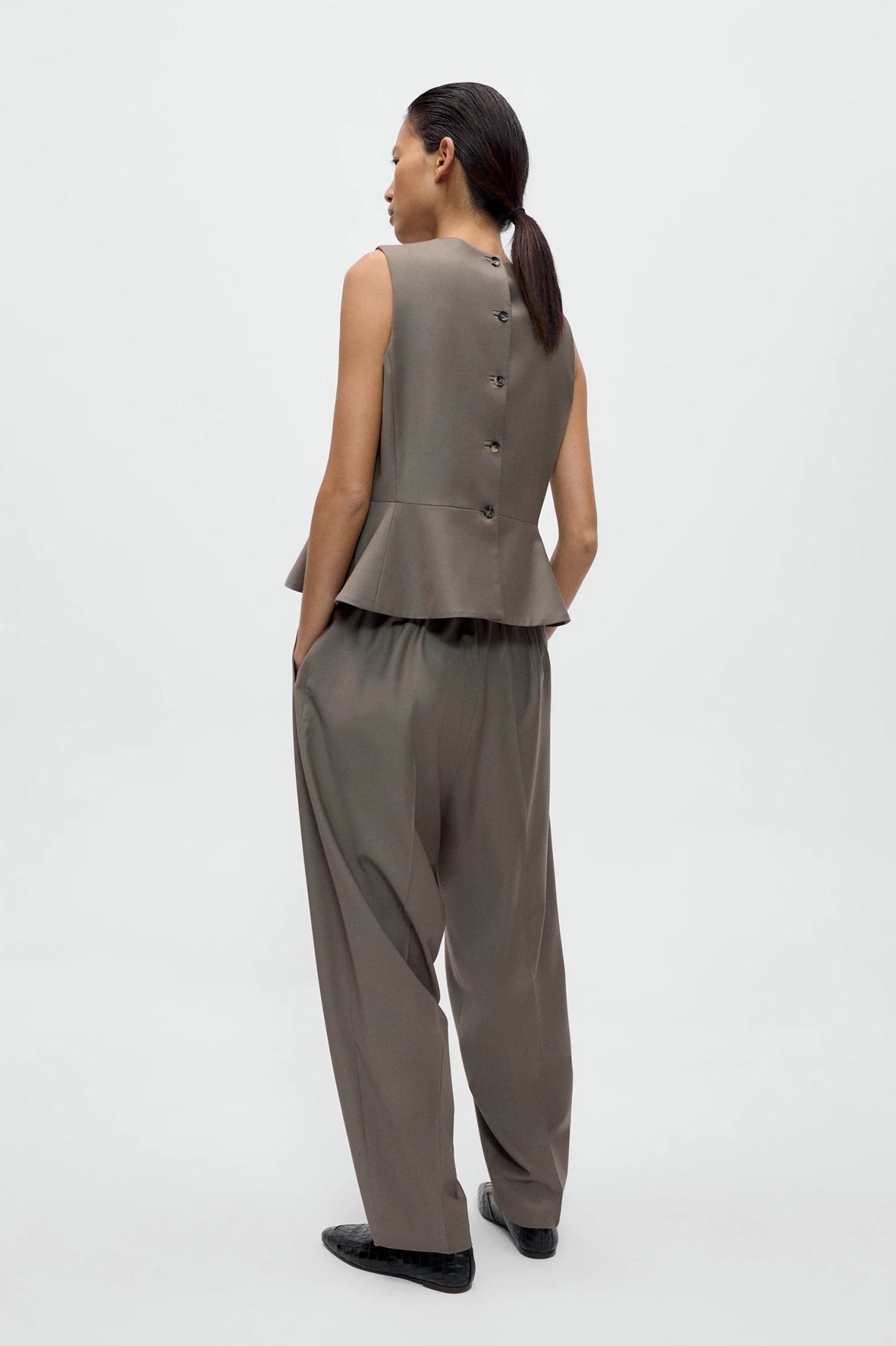 Chaleco tailored peplum
