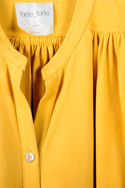 Camisa ante manga ancha