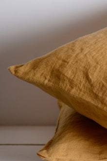 Light caramel washed linen cushion