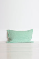 Green striped cushion 