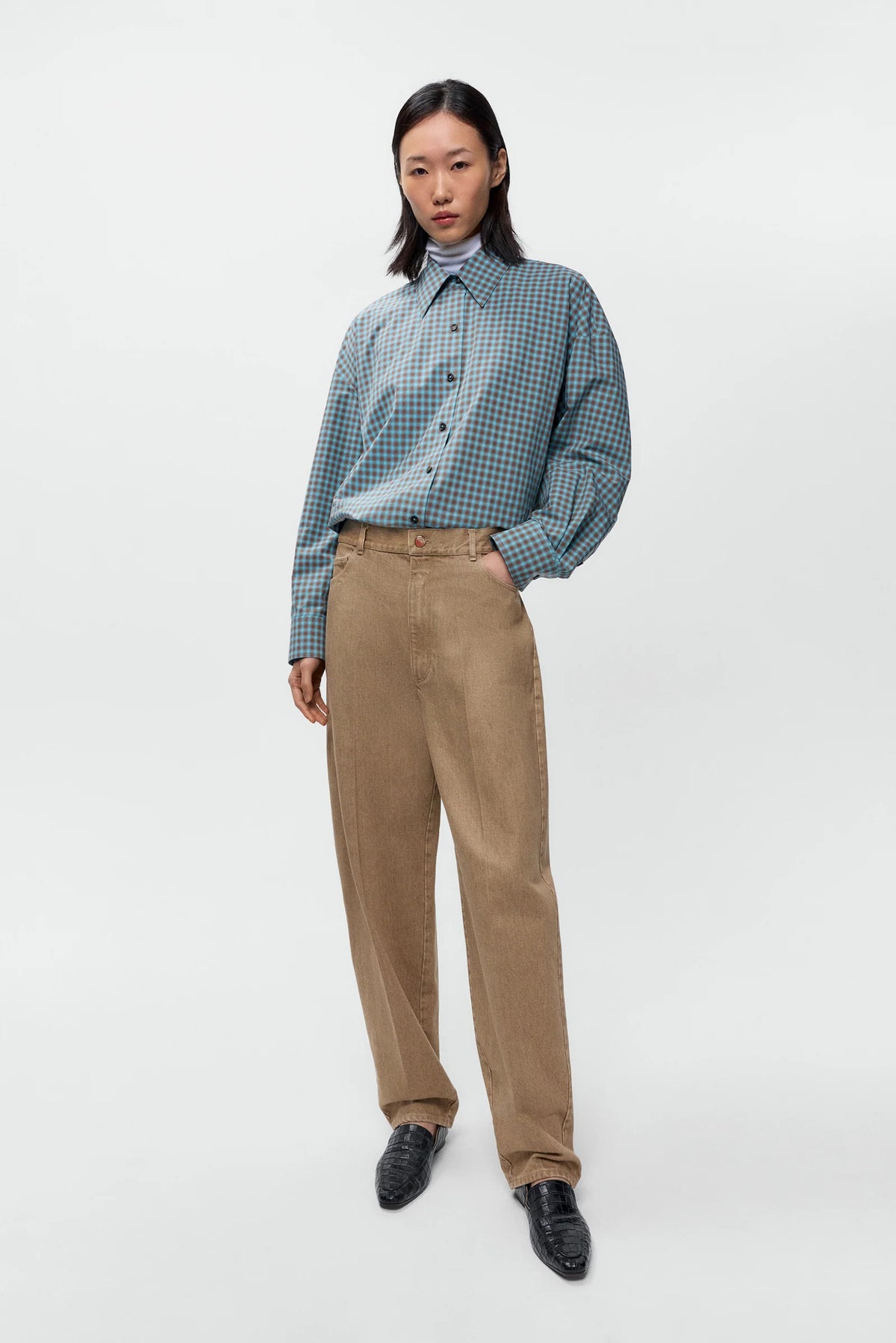 Pantalón jeans bolsillo redondo