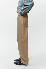 Pantalón jeans bolsillo redondo