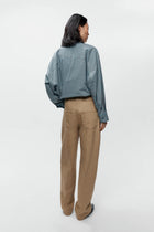 Pantalón jeans bolsillo redondo