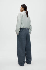 Pantalón washed denim curved