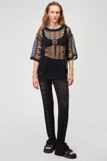 Thick ribbed knit trousers with diamonds