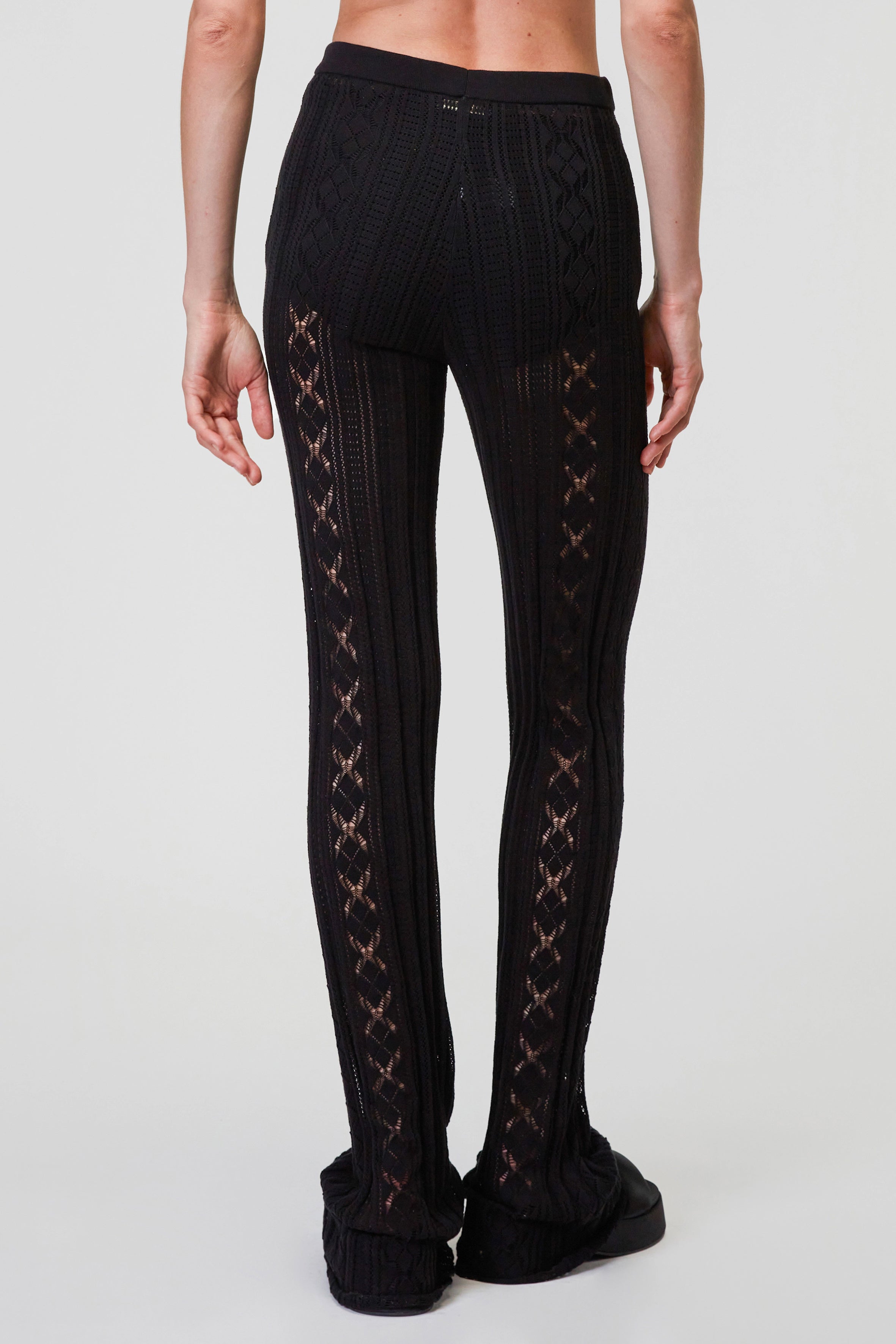 Thick ribbed knit trousers with diamonds