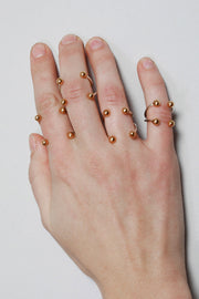 Anillo doble cuatro bolitas