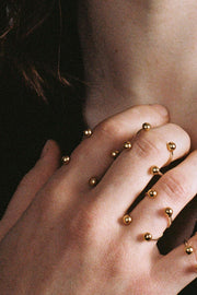 Anillo doble cuatro bolitas