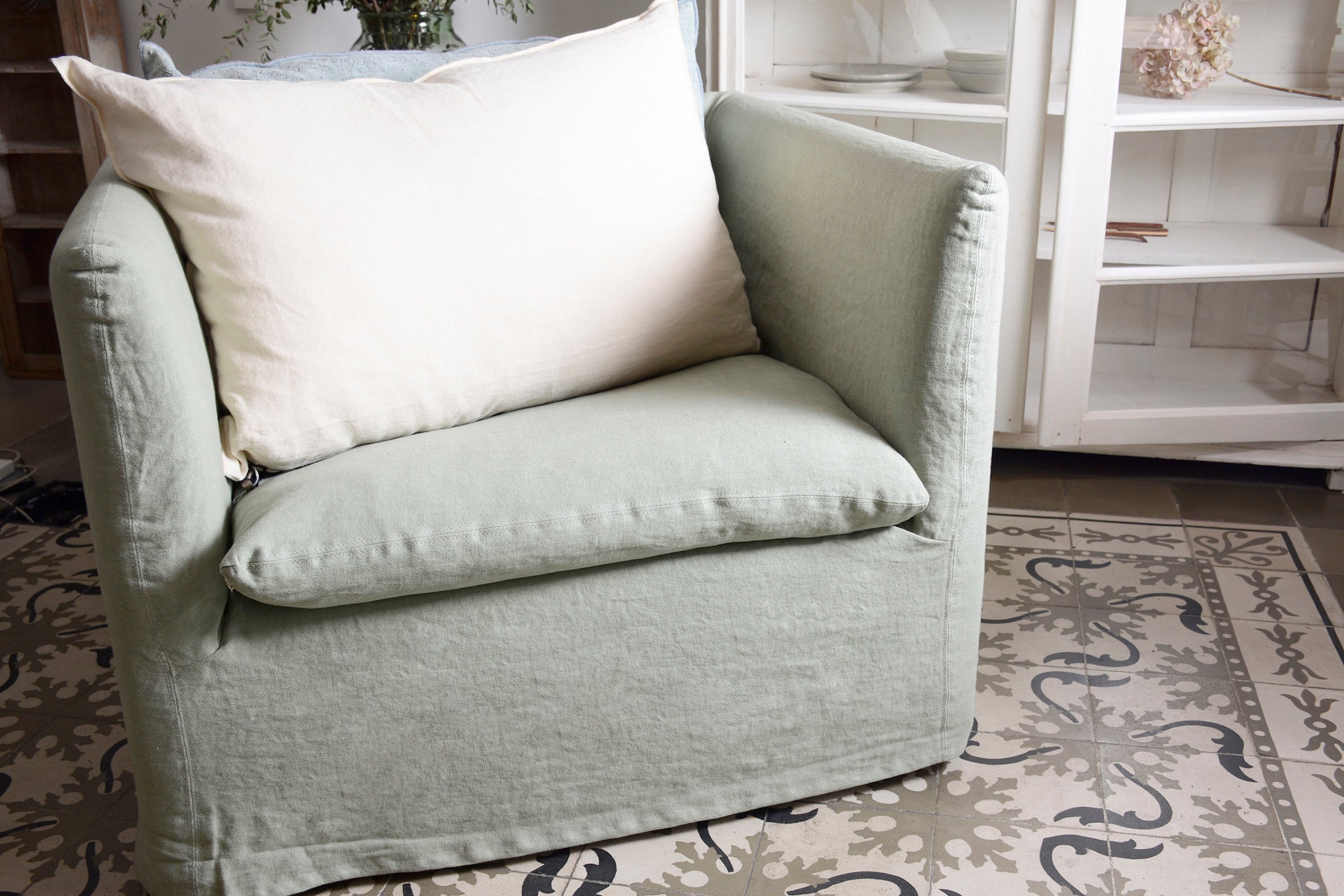 Green linen armchair