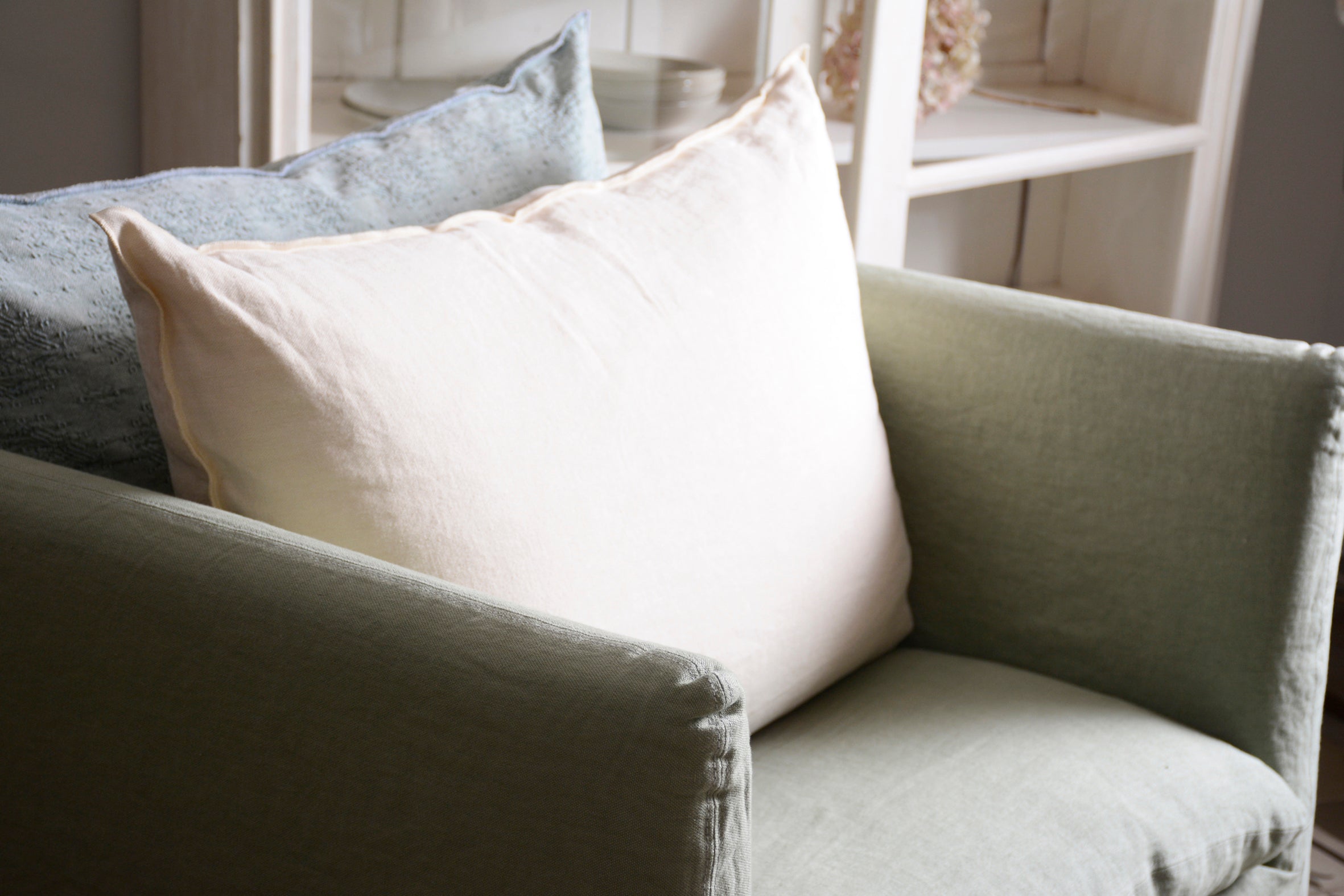 Green linen armchair