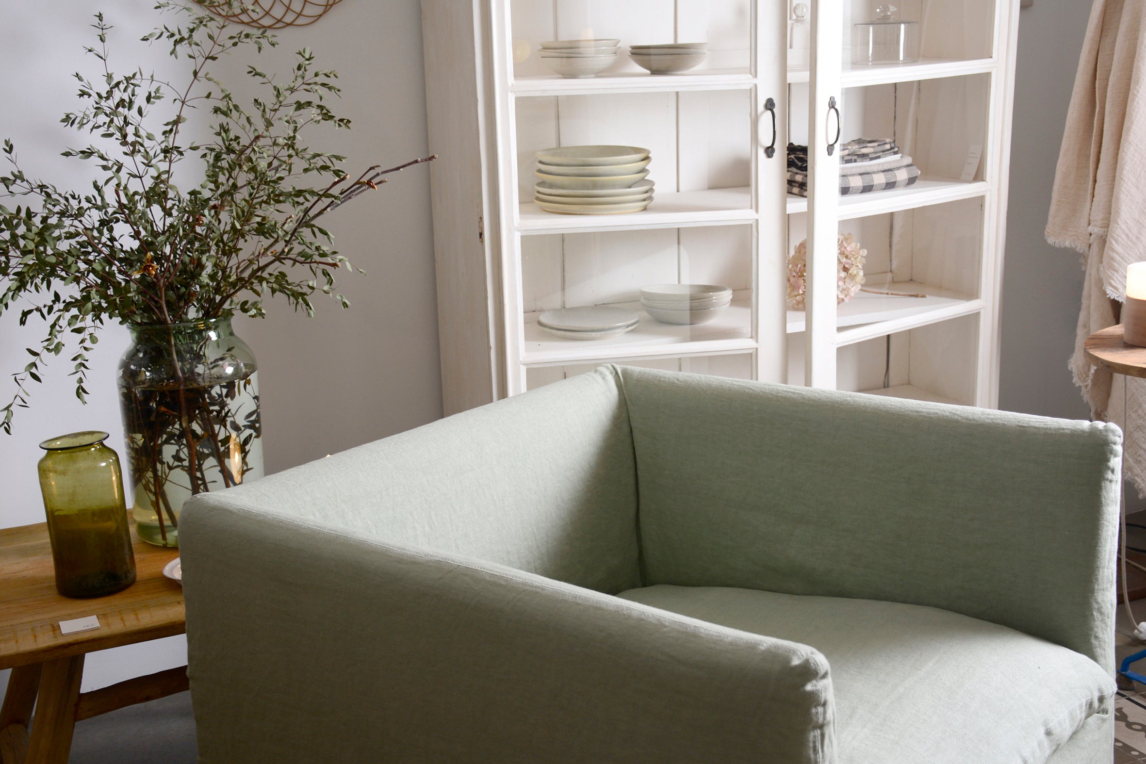 Green linen armchair